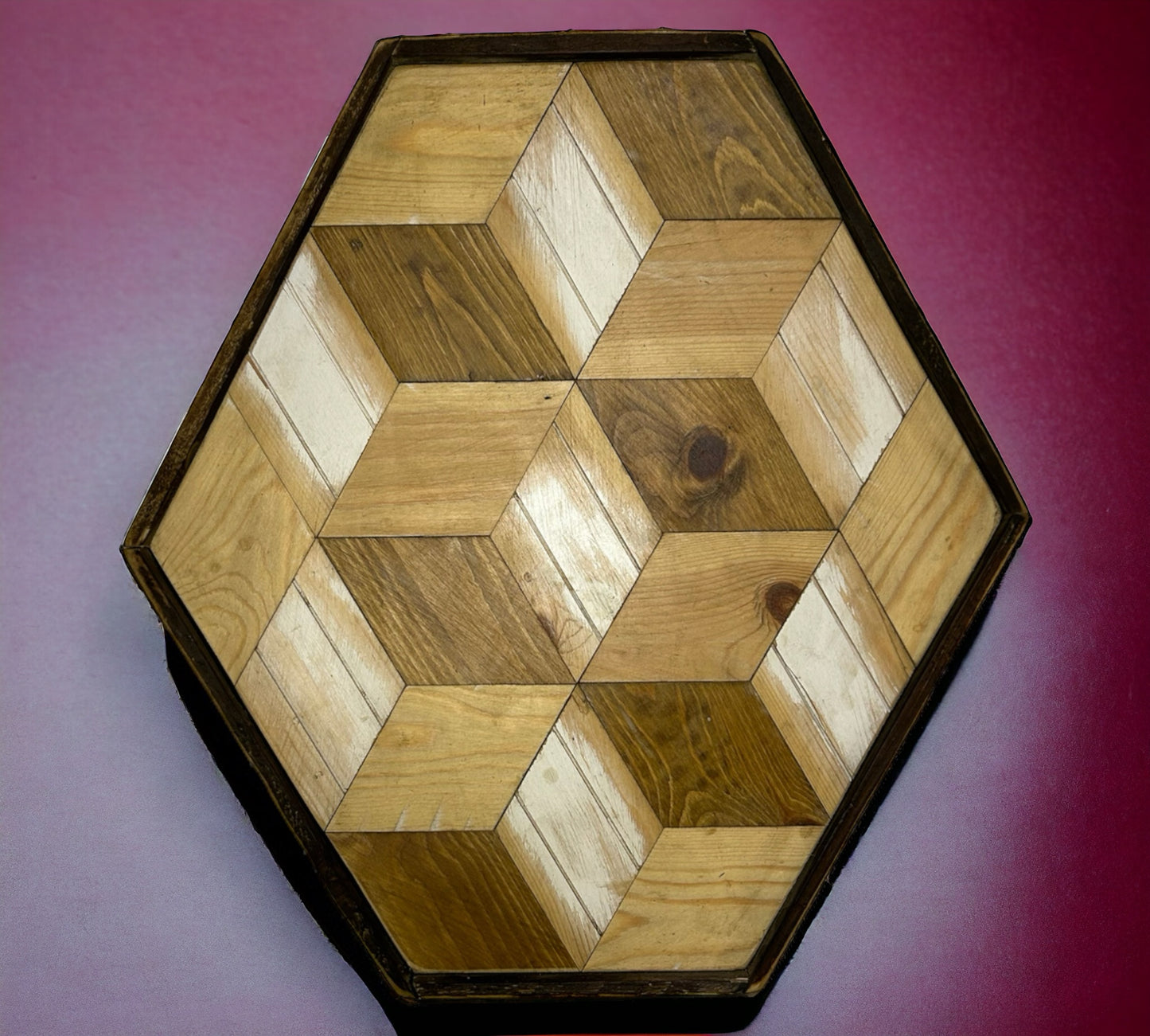 A Six Sided Piece of Reclaimed Wood Wall Art with White Flashes.